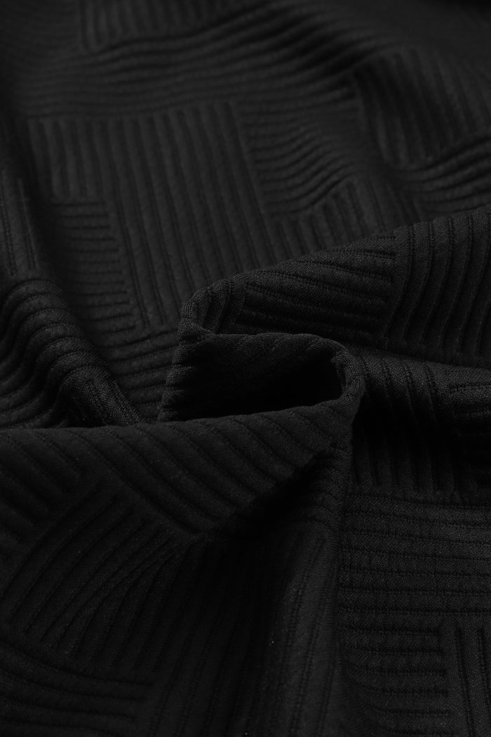 Veste boutonnée noire à poche à rabat texturé uni