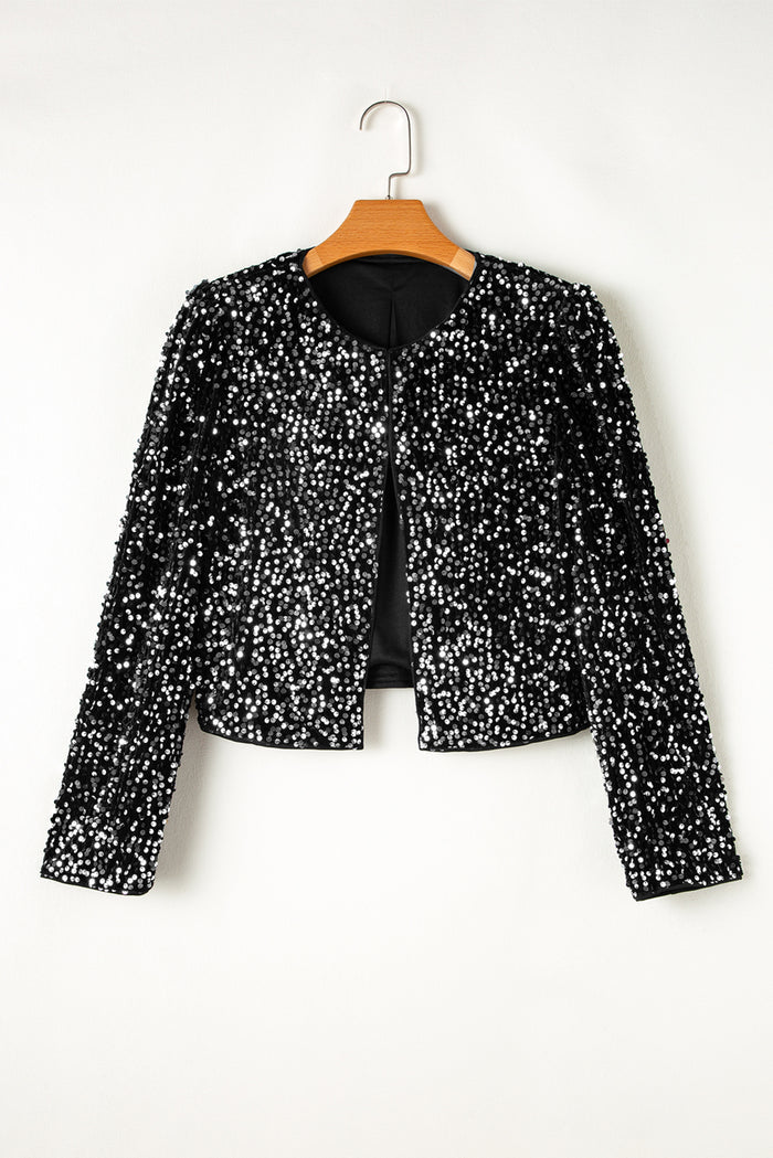 Veste courte noire à sequins ouverte sur le devant