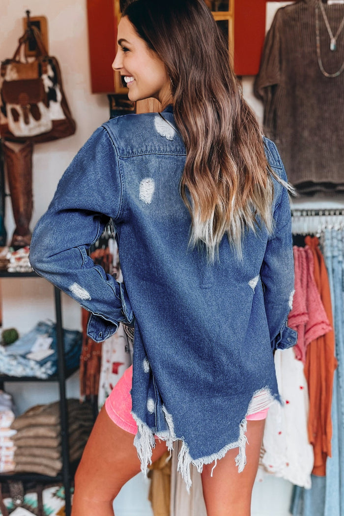Veste longue en jean effiloché effet vieilli *