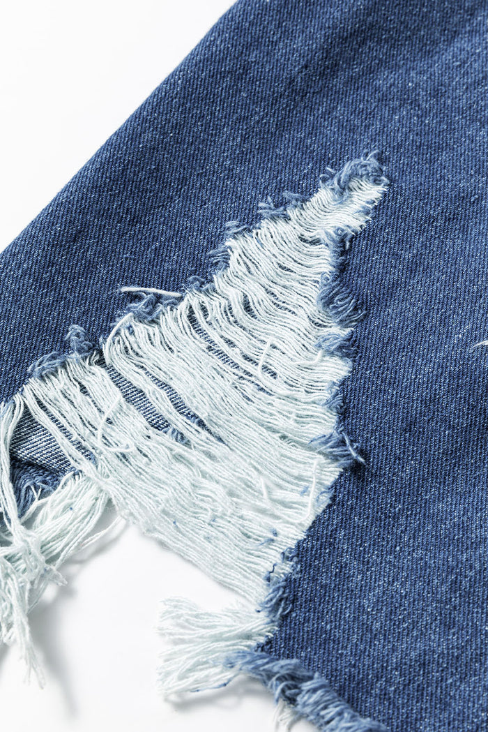 Veste longue en jean effiloché effet vieilli *