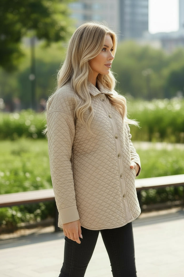 Veste matelassée boutonnée de couleur unie