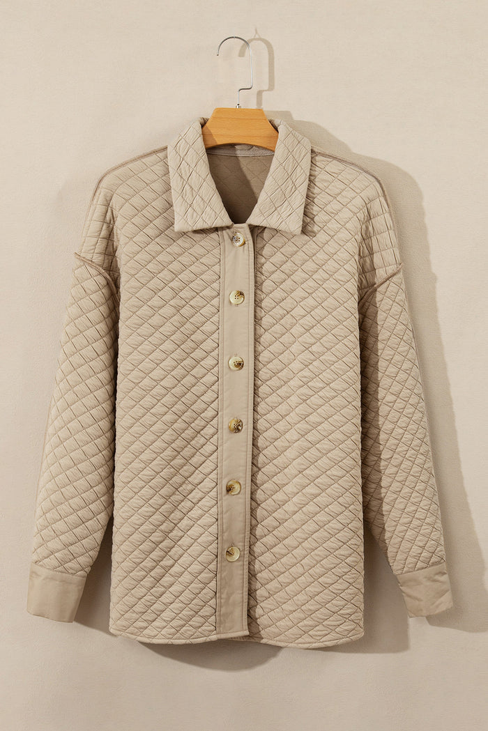 Veste matelassée boutonnée de couleur unie