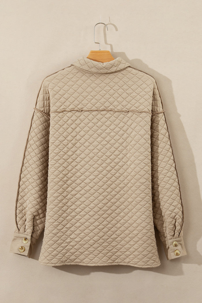 Veste matelassée boutonnée de couleur unie