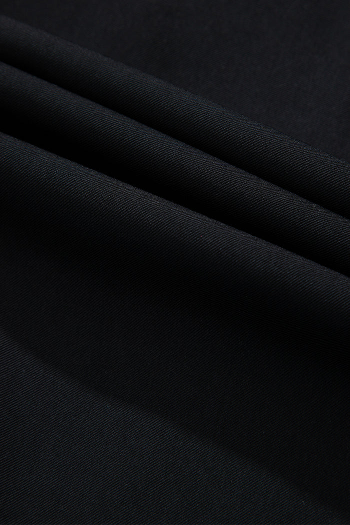 Veste noire à col et manches avec fermeture éclair et rabat