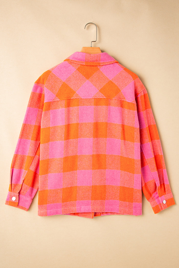 Veste orange à carreaux avec poches poitrine et col rabattu