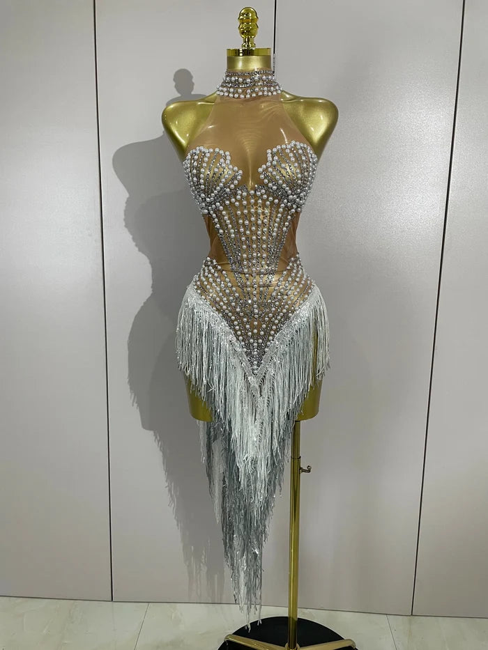 Vonda sparkly rhinestone and pearl tassel mesh see-through dress for evening parties, birthdays, or club events.